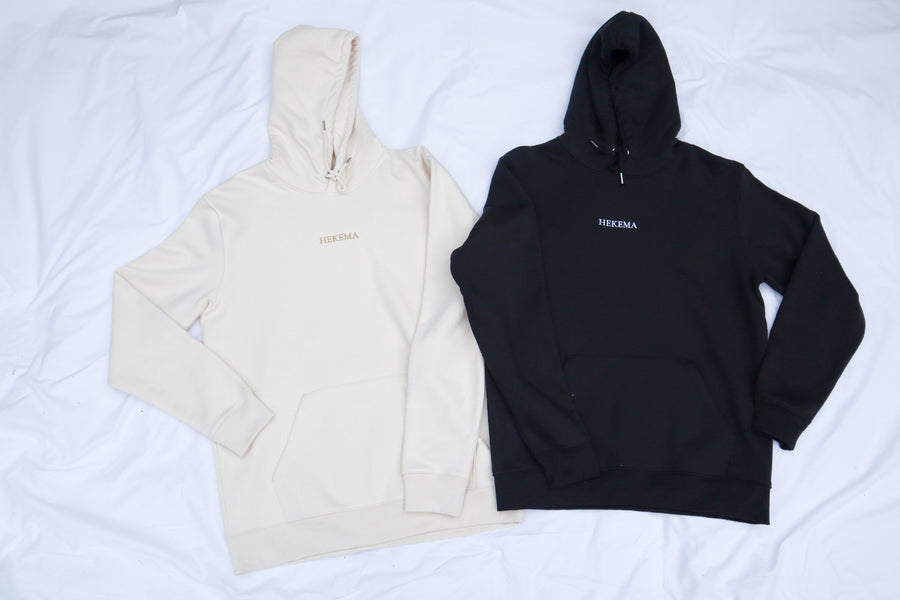black and cream hoodie with embroidered centre logo  